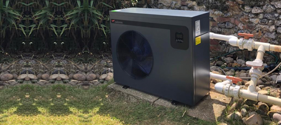 Dantherm Calorex I-Pac+ Swimming Pool heat pump inverter in garden in Essex 