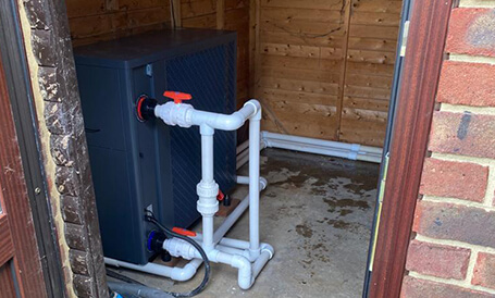 Recently repaired pool heater in enclosure